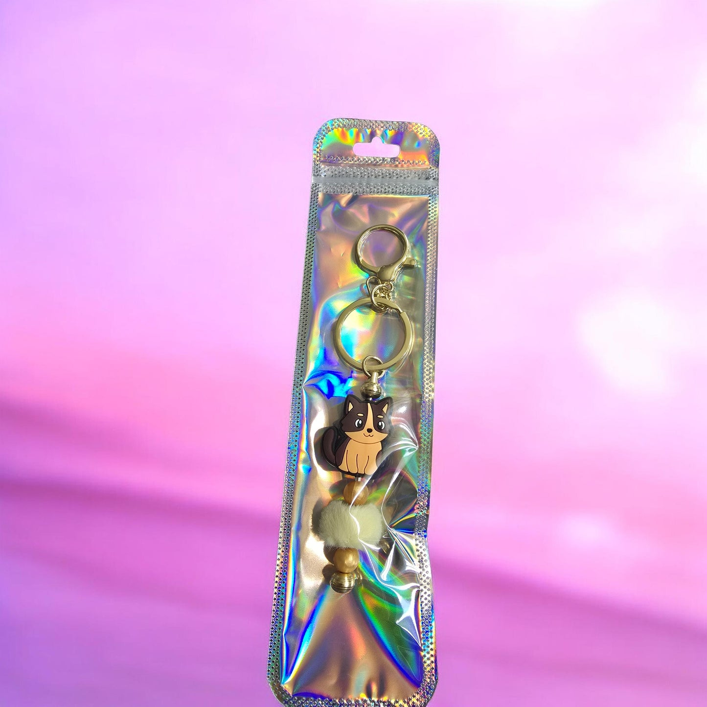 brown and tan cay gold keychain