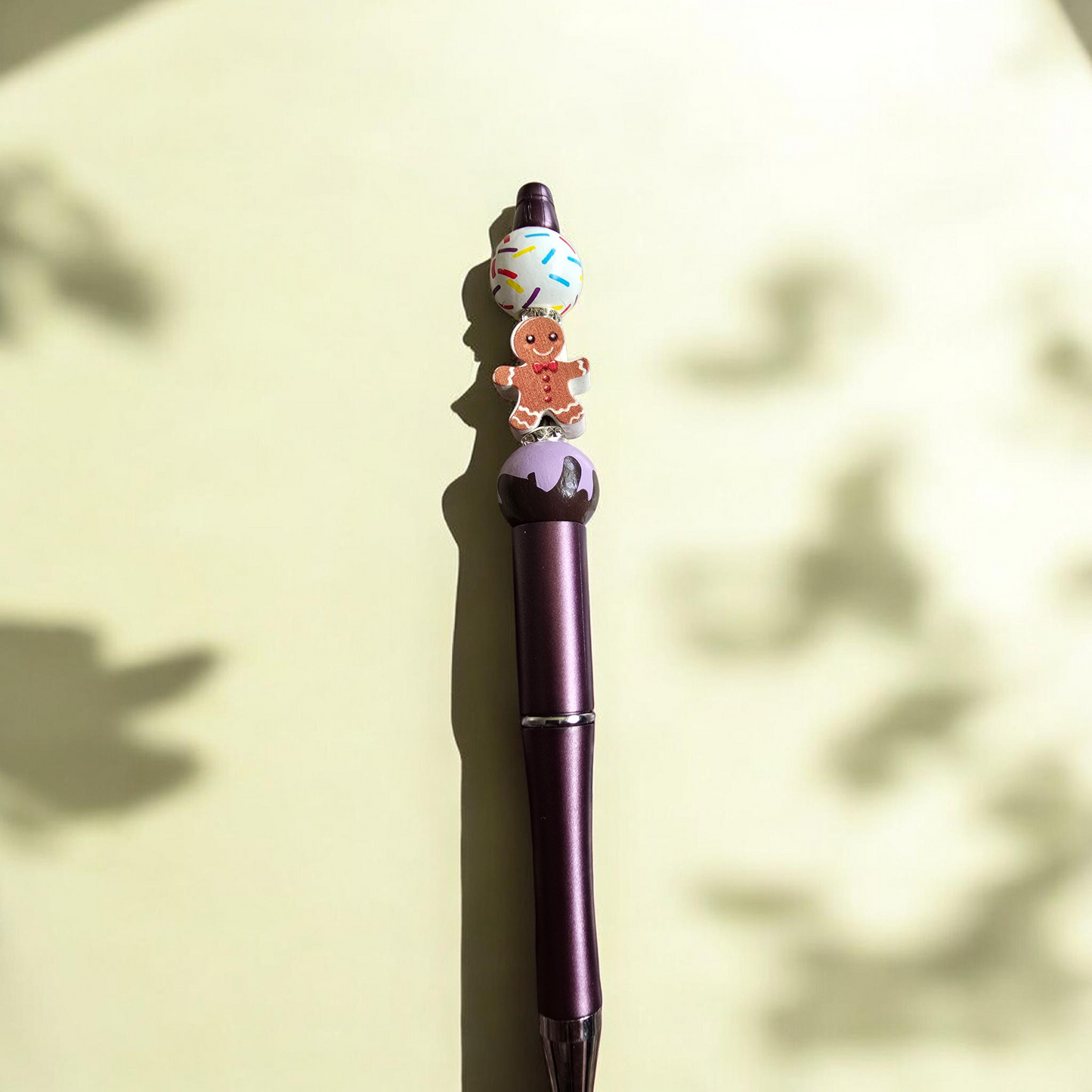 Plum ginger bread man pen