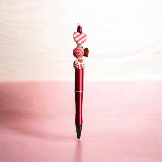 Red love heart pen