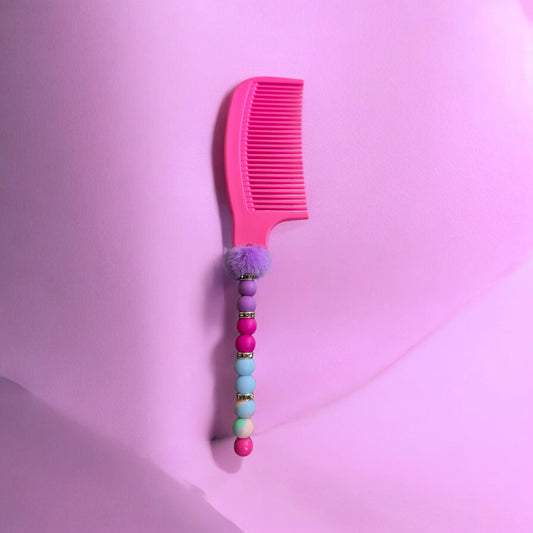 pink beaded comb
