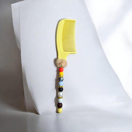 yellow beaded comb