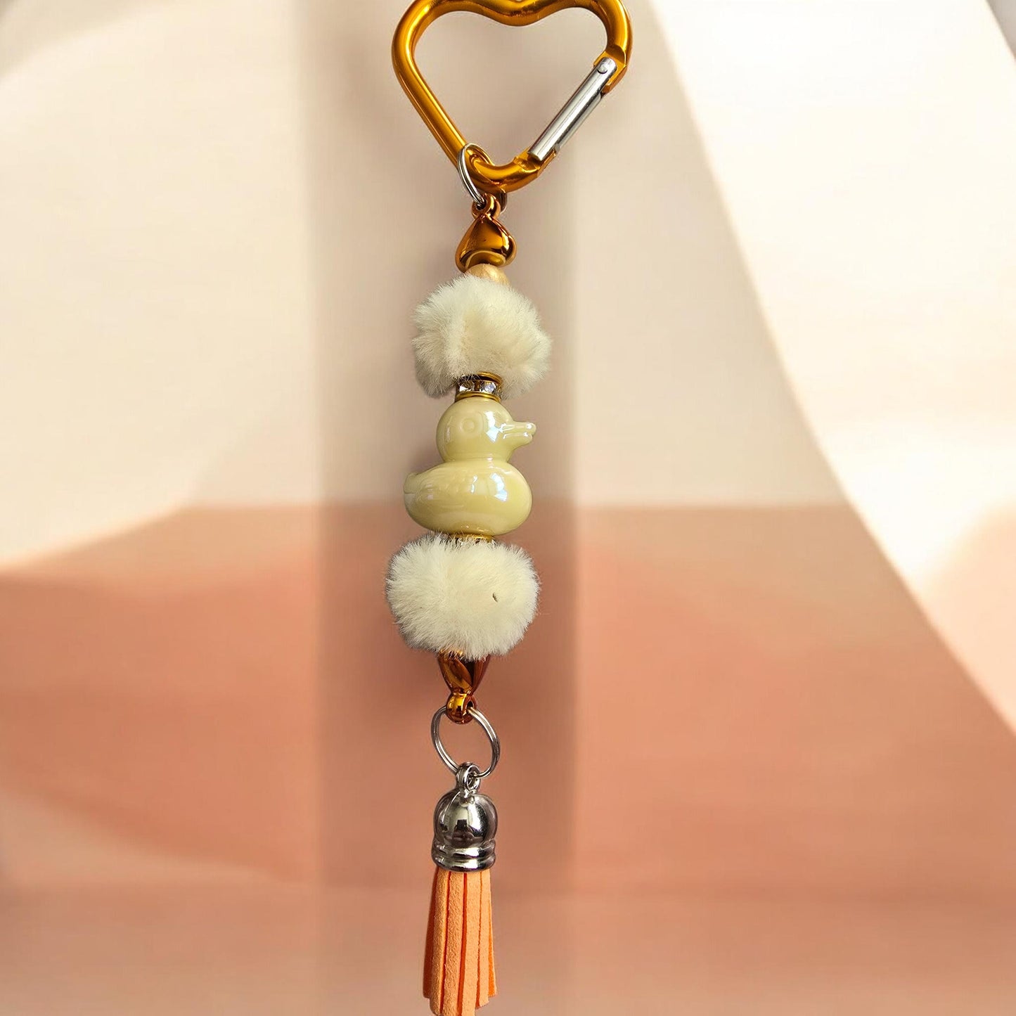 orange bag charm with yellow duck